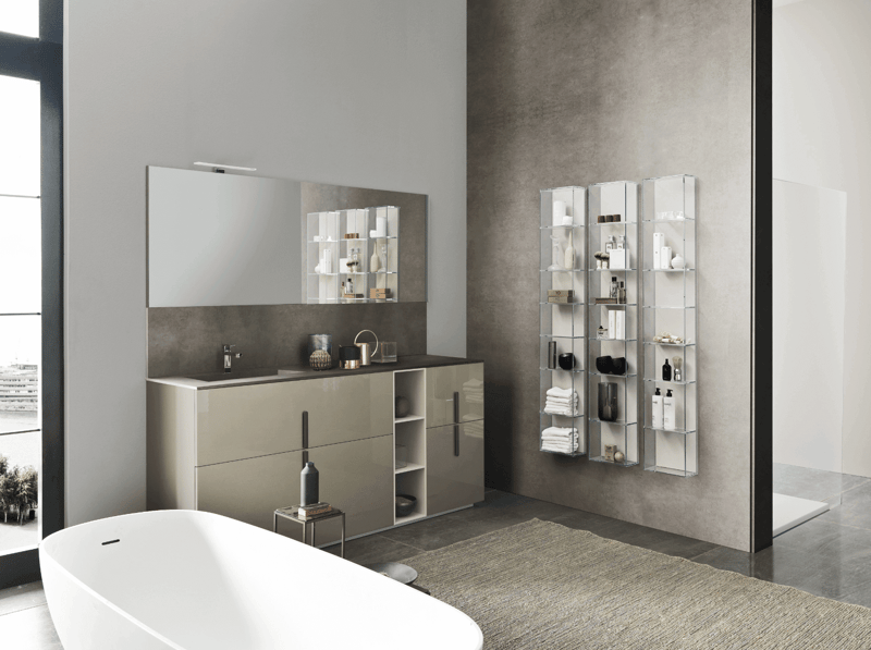 Luxury open floor bathroom with modular vanity, a free-standing tub and open storage