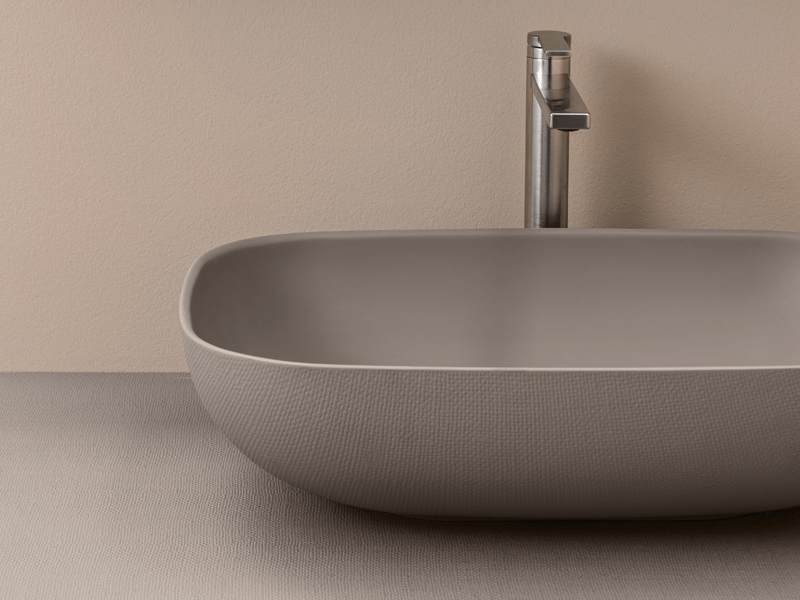 Textured bathroom vessel sink