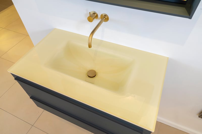 glass bathroom countertop with integrated basin
