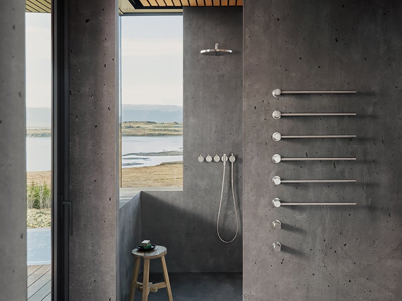 A VOLA shower system and towel warmer