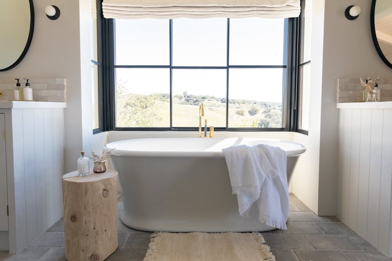 White tub with wood accessories