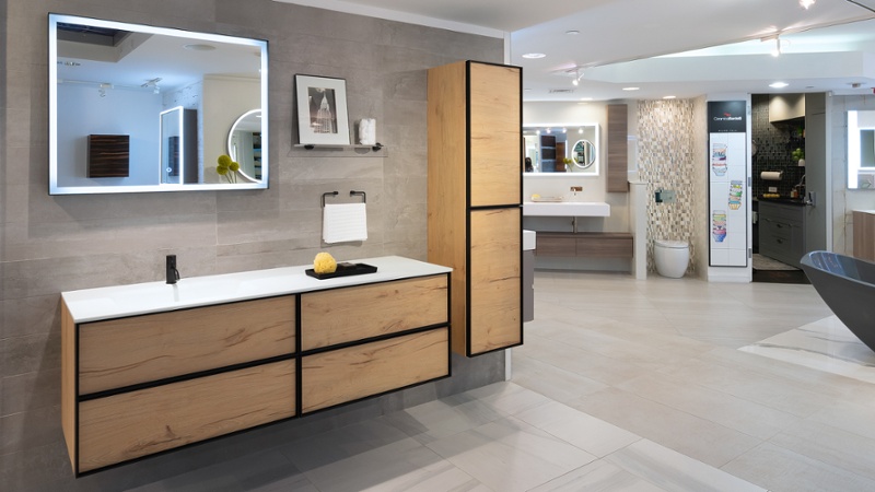 Coordinating bathroom vanity and wall-storage in wood tones