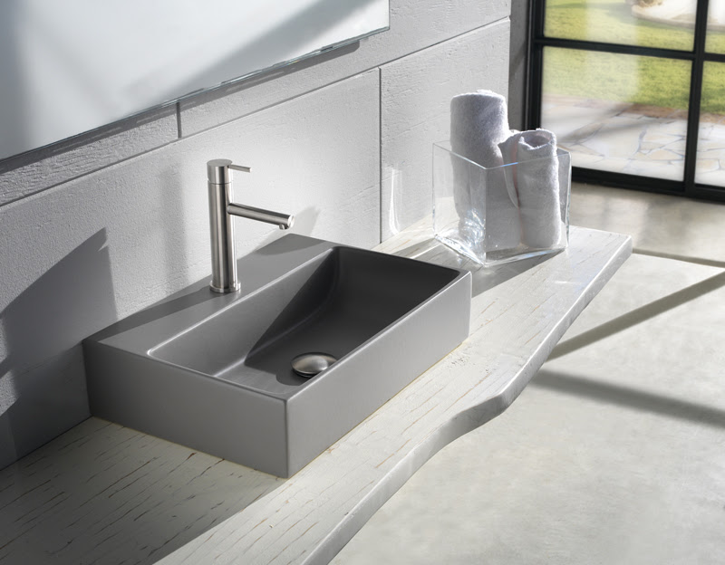grey ceramic basin with silver faucet